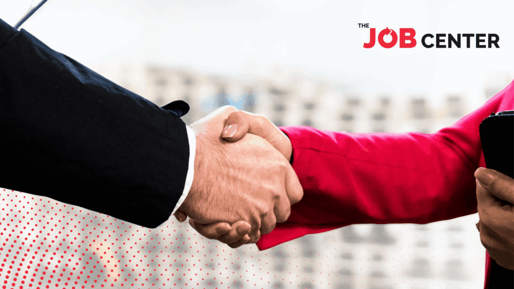 Closeup of a handshake between an employer and employee